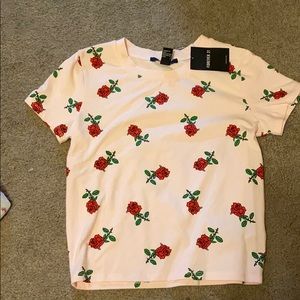 pink tee shirt w/ roses